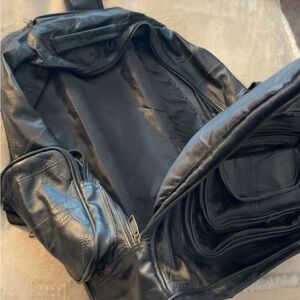 Carry on backpack with wheels